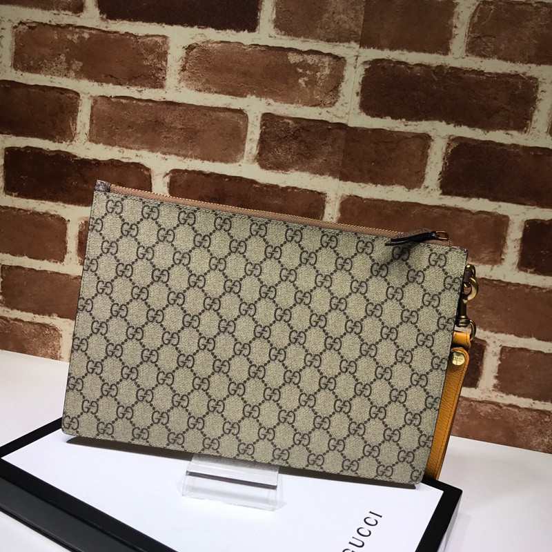 G*u*i clutch bag