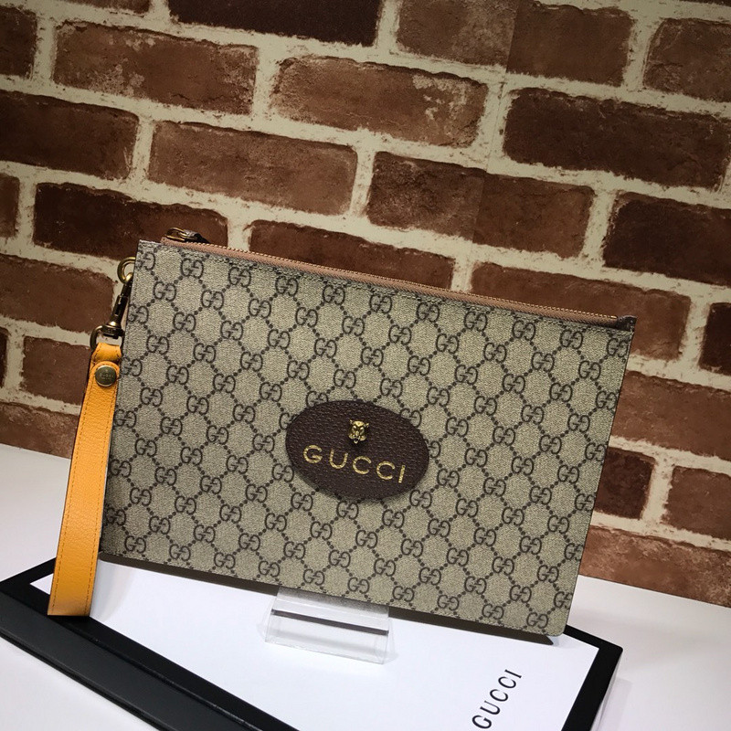 G*u*i clutch bag